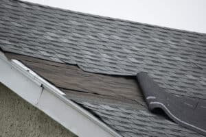 Damaged roof with bad shingles